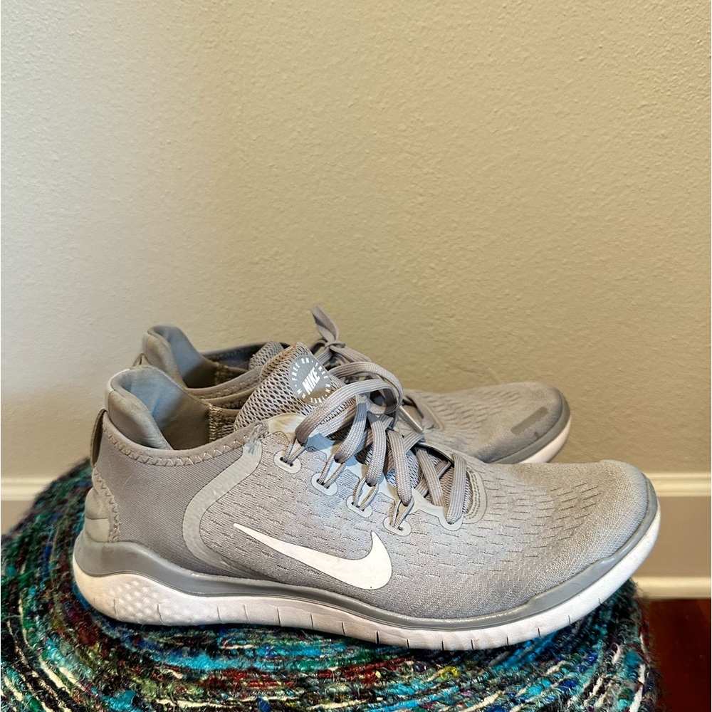 Women’s gray Nike shoes, size 10